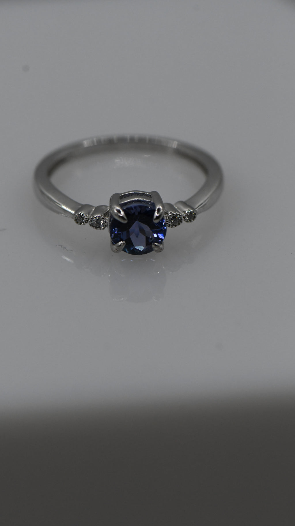 Round tanzanite ring
